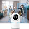 A Reolink indoor camera is shown in a living room setting, with a girl playing with a dog. The camera's detection zones are highlighted with blue boxes. Náhled obrázku produktu