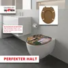 A modern bathroom setting with a wall-mounted toilet and sink. Produktbild-Vorschau