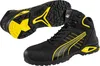 A pair of black and yellow Puma safety boots are shown against a white background. One boot is shown from the side, and the other is shown from the sole. Voir les images du produit
