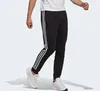 Adidas Pantaloni Essentials Tapered Cuff 3 Stripes, GK8831, Anteprima dell’immagine prodotto 16