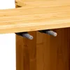 A close-up view of the underside of a wooden shelf with two gray mechanical components attached. Produktbild-Vorschau