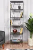 A tall, narrow bookshelf with multiple shelves, decorated with books, candles, and a glass bowl of nuts. Náhled obrázku produktu