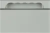 A close-up view of the top of a gray industrial enclosure with a scalloped handle cutout. Anteprima dell’immagine prodotto