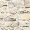 A close-up view of a stone wall texture. Produktbild-Vorschau