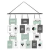 A wall hanging photo frame with multiple picture slots. Náhled obrázku produktu