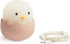 A cute chick night light in a pink eggshell, next to a white charging cable. Produktbild-Vorschau