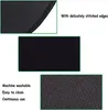 Collage of images showing details of a black mousepad, including its stitched edges, surface texture, and underside grip pattern, along with text describing its features. Produktbild-Vorschau