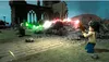 Two Lego figures are engaged in a magical duel in a ruined castle setting. Podgląd zdjęcia produktu