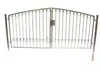 A silver metal double gate with vertical bars and decorative circles at the top and bottom, mounted on posts. The gate has a latch mechanism in the center. Produktbild-Vorschau