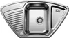 A top-down view of a stainless steel corner sink with a drainboard and a separate small basin. Náhľad obrázku produktu