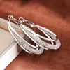 Boucles d'oreilles créoles pour femmes, argentées – Créoles Voir les images du produit 6