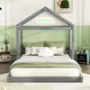A child's bed with a house frame, decorated with pillows and blankets, in a bedroom setting. Produktbild-Vorschau