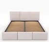 A cream-colored upholstered bed frame with a slatted base, shown from the front on a white background. Produktbild-Vorschau