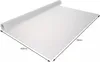 A roll of white anti-slip drawer liner is unrolled on a flat surface, showing its dimensions. Voir les images du produit