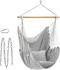 A hanging chair with two pillows and metal chains, isolated on a white background. Produktbild-Vorschau