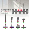 A display of vacuum cleaner attachments and a wall-mounted organizer. Produktbild-Vorschau