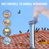 A chimney cap on a tiled roof with birds and leaves. Voir les images du produit