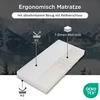 A mattress is shown with diagrams and text highlighting its features against a mountain backdrop. Produktbild-Vorschau