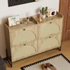 A shoe cabinet with decorative items on top, placed in a hallway or entryway. Anteprima dell’immagine prodotto