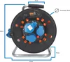 A close-up, front-facing view of a black cable reel with orange and blue accents, featuring measurement annotations. Produktbild-Vorschau