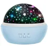 A blue star projector night light with a dome-shaped top displaying colorful stars and a moon. Náhľad obrázku produktu