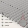 A close-up view of a gray pleated blind, with icons and text describing its features. Produktbild-Vorschau