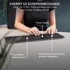 A person's hands are shown typing on a black Cherry keyboard, with marketing text overlaid on the image. Produktbild-Vorschau