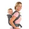 A woman is carrying a baby on her back using a baby carrier. Anteprima dell’immagine prodotto