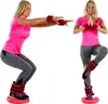 A woman is shown performing exercises with fitness equipment. Podgląd zdjęcia produktu