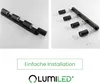 Two product shots of a black ceiling spotlight fixture, one showing the assembled fixture and the other showing it disassembled with parts laid out. Below the product shots is a green box with text and a logo. Voir les images du produit