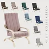 A collage of different colored armchairs with a large pink armchair in the foreground. Podgląd zdjęcia produktu