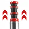 Close-up of a hydraulic bottle jack mechanism with red and black components, flanked by red arrows indicating upward movement. Náhľad obrázku produktu