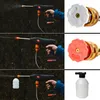 Collage showing a cordless pressure washer being used with different attachments and a foam cannon. Náhled obrázku produktu