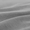 A close-up view of gray fabric with visible texture and folds. Produktbild-Vorschau