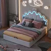 A child's bedroom with a cloud-shaped bed, decorated with moon and star lights. Náhled obrázku produktu