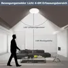 A person walking in a modern living room with a ceiling light. Produktbild-Vorschau
