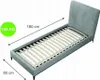 A gray bed frame with a slatted base, shown from a high-angle view. Náhled obrázku produktu