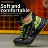 A close-up shot of a person wearing a black and green safety shoe, with text overlays highlighting its features. Produktbild-Vorschau