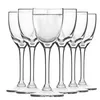 A group of six clear glass shot glasses, one of which is filled with a clear liquid. Náhľad obrázku produktu