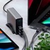 A Satechi charger is shown connected to a laptop and two phones, demonstrating its multi-device charging capability. Anteprima dell’immagine prodotto
