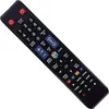 A black TV remote control with various buttons. Produktbild-Vorschau