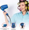 A woman with hair rollers is smiling while holding a blue hairdryer. Insets show close-ups of the hairdryer's features. Anteprima dell’immagine prodotto