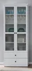 A white display cabinet filled with dishes and glasses. Produktbild-Vorschau