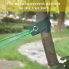 A close-up of a tree support strap and rope attached to a young tree. Produktbild-Vorschau