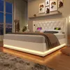 A modern bedroom scene at night with a white upholstered bed as the main focus. Náhled obrázku produktu