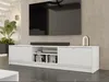 A white TV lowboard with fluted doors and gold handles, featuring a soundbar, books, and decorative items on top, in a modern living room setting. Náhled obrázku produktu