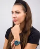 A woman wearing a watch. Produktbild-Vorschau