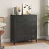 A black metal dresser with four drawers is shown in a room setting. Produktbild-Vorschau