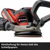 Close-up of a red and black Einhell cordless orbital sander. Produktbild-Vorschau