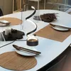 A table setting with a modern spiral lamp as the centerpiece. Podgląd zdjęcia produktu